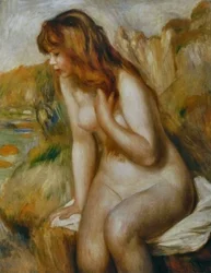 Bañista sentada en la roca